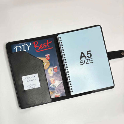 Notebook with a black leather cover and a visible 'A5 Size' label on a white background